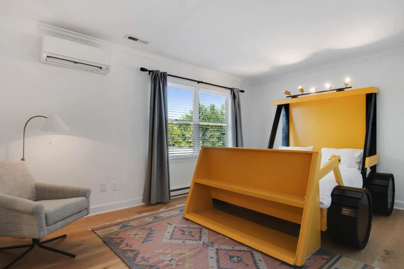 Room 28 — Backhoe Queen Bed